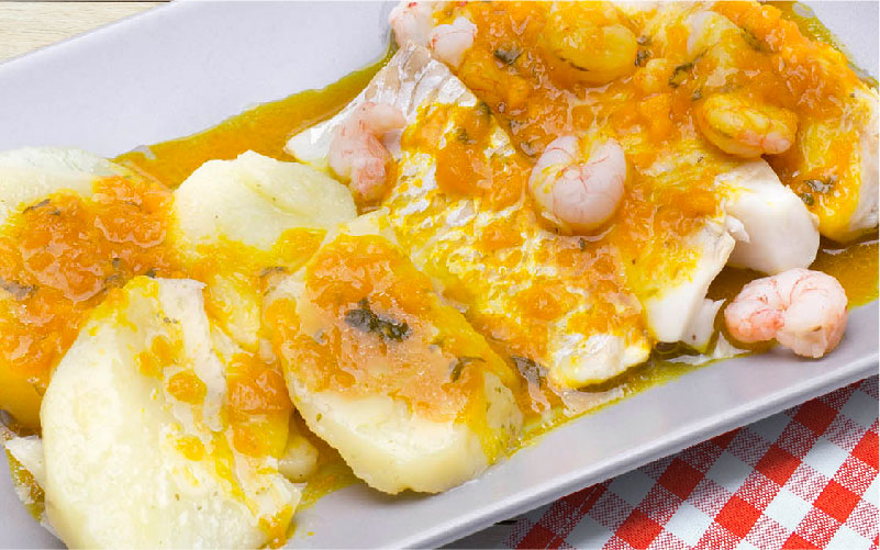 Lubina en all i pebre
